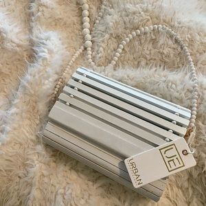 Wood beach and summer bag